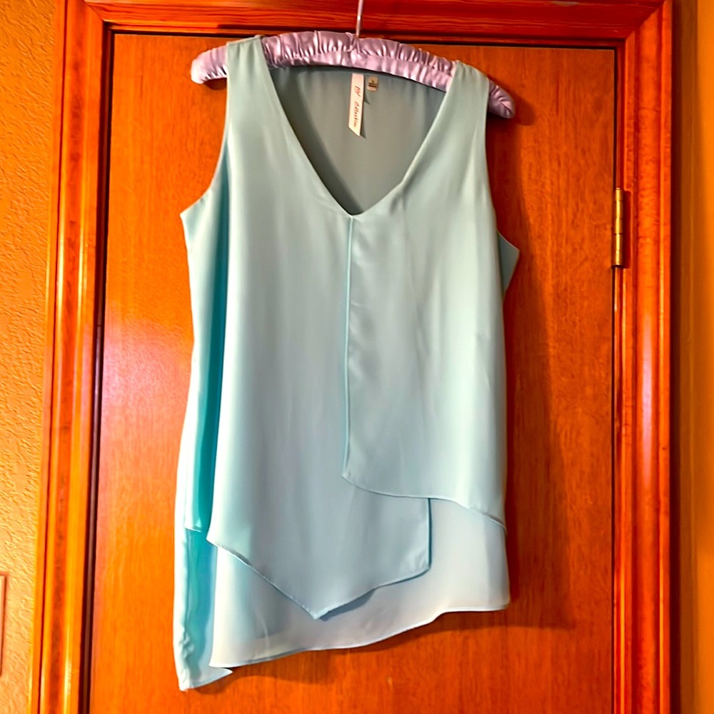 Asymmetrical sleeveless V-neck top